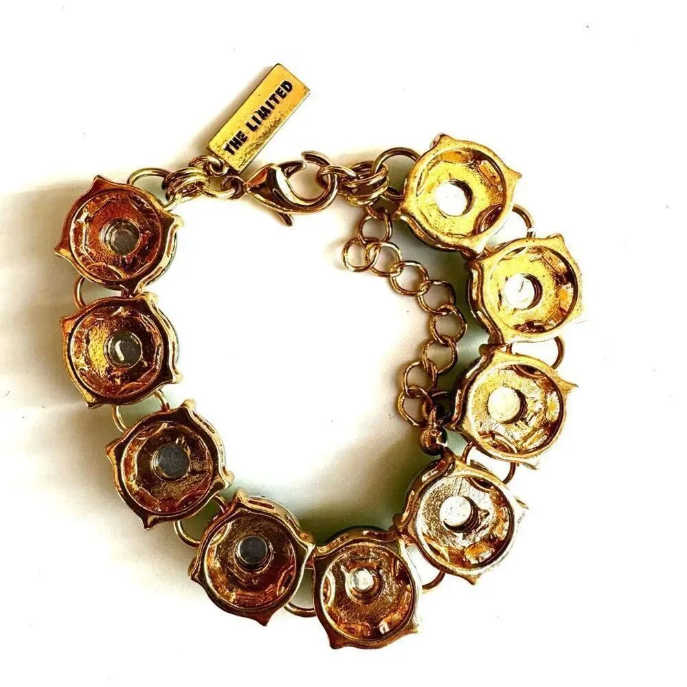 The Limited gold tone and green bracelet